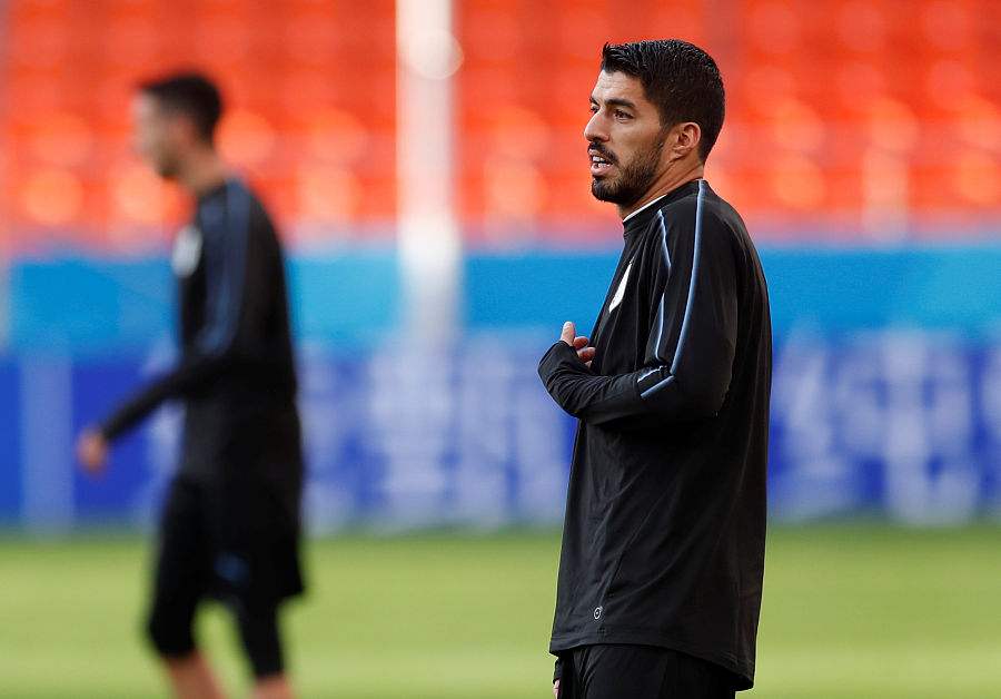 俄罗斯与乌拉圭争夺小组头名,沙特和埃及享受