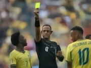 England vs. Argentina referee: American Elfas, 68 yellow cards, 2 red cards, and 6 penalty kicks in his last 20 matches.