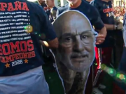 During Spain's victory parade, fans presented them with cardboard trophies featuring De la Fuente's image.
